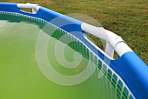 Super Green Water with Algea in Backyard Swimming Pool