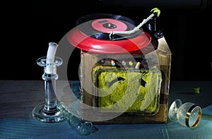 Super grungy turntable assemblage with vinyl record