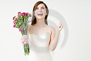Super happy bride celebrating after marrying photo
