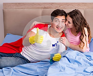 Super hero husband in bed