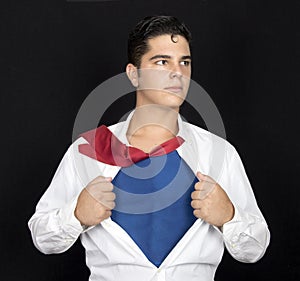 Super hero tearing his shirt off with copy space