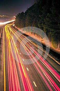 Super highway with high volume of cars at night