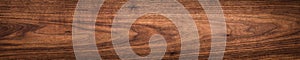 Super long walnut planks texture background. Walnut wood texture. Texture element