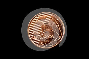 Brazilian 5 Centavo Coin Isolated On A Black Background photo