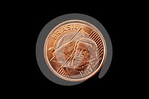 Brazilian 5 Centavo Coin Isolated On A Black Background photo