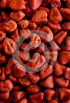 Super macro shot of exotic background annato seeds fom Africa in details very close. achiote paste for cooking and for coloring fo