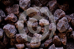 super macro shot of exotic black salt from India in detail very close. Ideal food spice backgound.