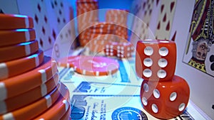 Super macro shot of set for playing poker. Playing cards, dollars, chips, red dice close up. Vertically sliding camera.