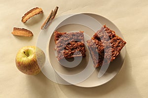 Super moist cinnamon flavored apple cake with a crust of cinnamon butter and brown sugar