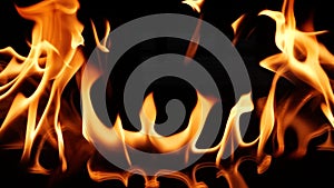 Super slow motion of abstract fire flames isolated on black background burning