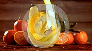 Super slow motion Fresh tangerine juice