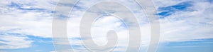 Super wide angle panorama cloudy sky, natural background, banner format