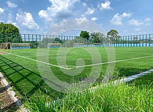 Super wide angle view of open spacious futsal field in HDB heartland in Singapore. Community football pitches in local