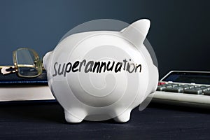 Superannuation written on a white piggy bank photo