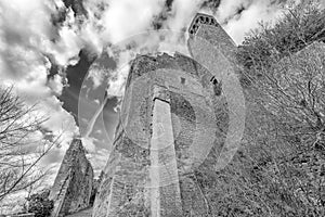 Superb black and white view of the ruins of the Rocca Aldobrandesca of Sovana, Grosseto, Tuscany, Italy