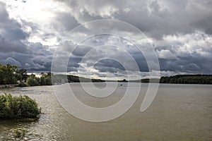 Superb landscape from the natural reserve of the Danube Delta Biosphere - landmark attraction in Romania; dramatic sky before the