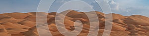 Superb panorama of rounded sand dunes in the Rub Al Khali desert, Arabian peninsula photo