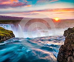 Superb summer sunrise on Godafoss Waterfall. Impressive morning scene of Skjalfandafljot river, Iceland, Europe. Beauty of nature