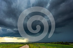 Supercell storm clouds with intense tropic rain