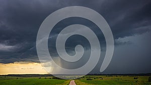 Supercell storm clouds with intense tropic rain