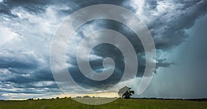 Supercell storm clouds with intense tropic rain