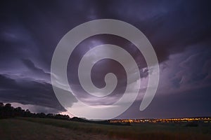 Supercell storm clouds with intense tropic rain