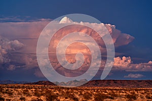 Supercell thunderstorm cumulonimbus cloud at sunset