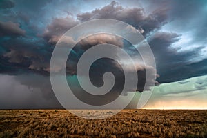 Supercell thunderstorm with dark clouds and dramatic sky