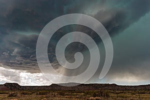 Supercell thunderstorm with dramatic clouds and hail.