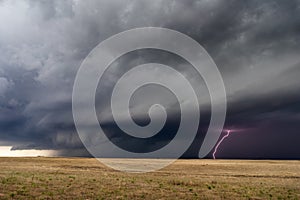 Supercell thunderstorm and lightning bolt