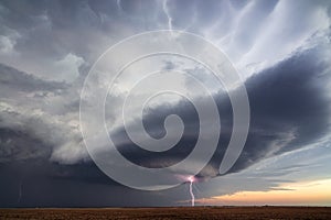 Supercell thunderstorm with lightning and stormy sky