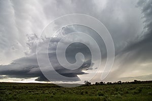 A supercell thunderstorm updraft spirals high into the sky of eastern Colorado in this eerie scene.