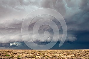 Supercell thunderstorm with wall cloud.