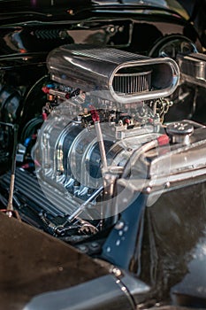 Supercharged v8 engine of a classic car, Surrey, UK