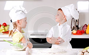 Supercilious little boy chef photo