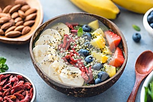 Superfood smoothie in coconut bowl