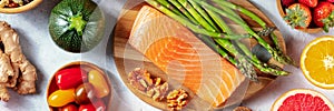 Superfoods panorama. Top flat lay shot of salmon, asparagus, etc