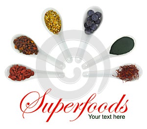Superfoods in porcelain spoons