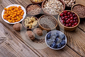 Superfoods set with seeds, nuts,  grains,  oatmeal.