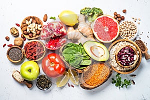 Superfoods on white background. Healthy vegan nutrition.