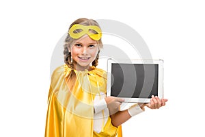 Supergirl with digital tablet