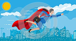 Superhero businesswoman flying over cityscape