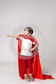 Superhero child pretend what she flying in sky