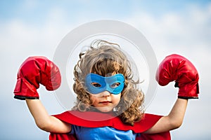 Superhero kid. Girl power concept