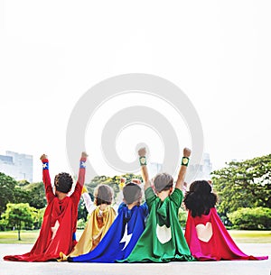 Superhero Kids Aspiration Imagination Playful Fun Concept photo