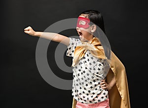 Superhero kids on a black background