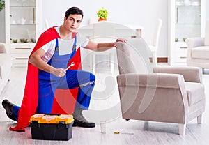 Superhero repairman with tools in repair concept