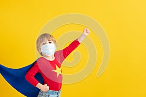 Superhero vs coronavirus COVID-19 pandemic concept