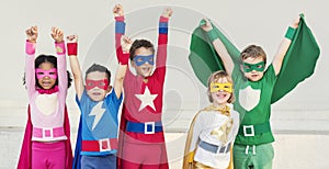 Superheroes Cheerful Kids Expressing Positivity Concept photo