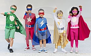 Superheroes Cheerful Kids Expressing Positivity Concept photo